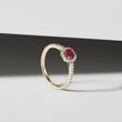 Ruby and diamond engagement ring in yellow gold