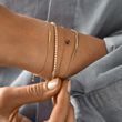 BRANSOLETKA Z 14-KARATOWEGO ŻÓŁTEGO ZŁOTA Z DIAMENTAMI - BRANSOLETKI TENISOWE - BRANSOLETKI