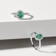 Oval emerald and diamond ring in white gold