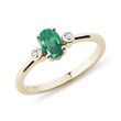 OVAL EMERALD AND BEZEL DIAMOND GOLD RING - EMERALD RINGS{% if category.pathNames[0] != product.category.name %} - {% endif %}