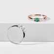 Emerald ring with diamonds in pink gold