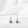 Baby blue topaz earrings in 14kt gold