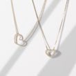 Heart-shaped diamond necklace in yellow gold