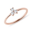 Prsten z růžového zlata se třemi diamanty