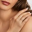 A THIN ROSE GOLD RING WITH A DIAMOND - BRILLIANT CUT DIAMOND ENGAGEMENT RINGS - ENGAGEMENT RINGS