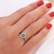 Emerald and diamond halo ring in white gold