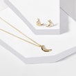 Crescent moon pendant and earring set in yellow gold