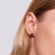 Boucles d'oreilles en or rose avec rhodolites