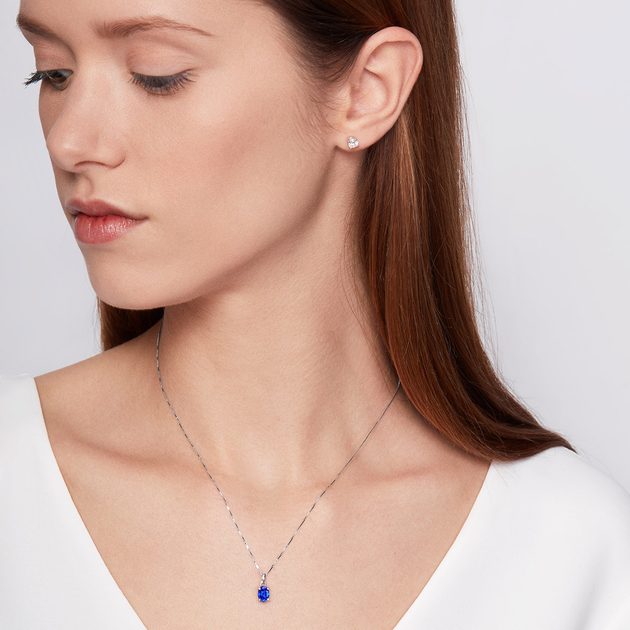 Oval blue sapphire necklace with diamonds