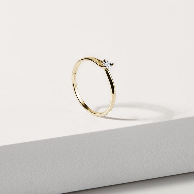 Simple gold ring hotsell with one diamond