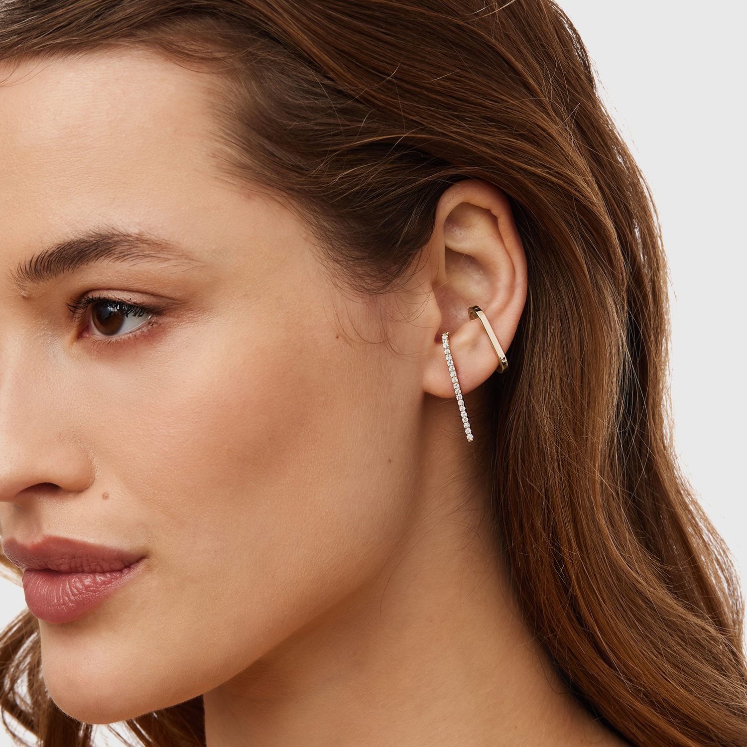 Diamantová náušnice a moderní ear cuff ve žlutém zlatě - KLENOTA