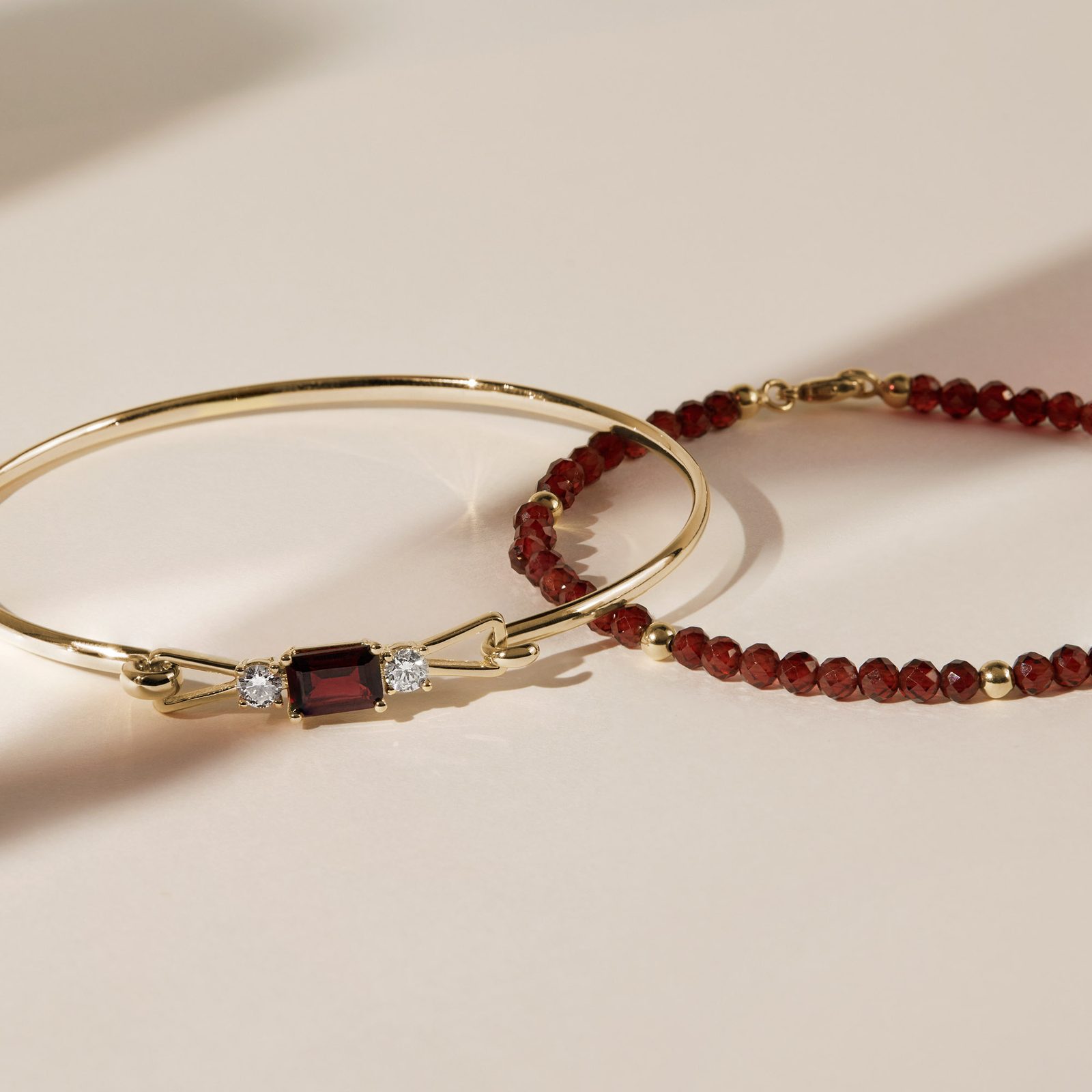 Garnet and Diamond Bracelet in Yellow Gold