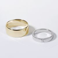 Snubní prsteny ze žlutého a bílého zlata - dámský s diamanty