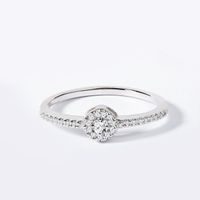 Diamond halo engagement ring in white gold