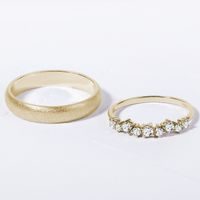 Snubní prsteny ze žlutého zlata - dámský s diamanty