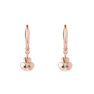 Boucles d'oreilles pendantes en or rose - trèfles