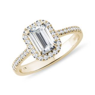 Emerald cut diamond engagement ring in yellow gold