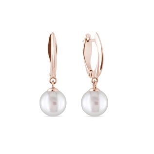 Boucles d'oreilles pendantes en or rose et perles