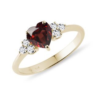 Heart shaped garnet and diamond ring in gold