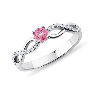 Pink sapphire and diamond engagement ring in white gold
