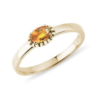 Oval citrine ring in yellow gold