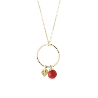 Zlatý náhrdelník s koralom a lístkom na kruhu