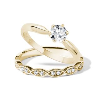 Elegant wedding and engagement rings in gold