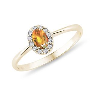 BAGUE EN OR JAUNE SERTIE D'UNE CITRINE ET DE DIAMANTS - BAGUES EN CITRINE - BAGUES