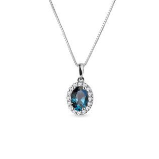 Pendant made of 14k white gold decorated with a blue London topaz