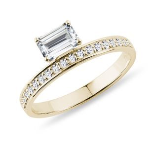 Moissanite and diamond ring in 14k yellow gold