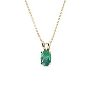 Oval cut emerald necklace in yellow gold