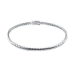 DELIKATNA BRANSOLETKA TENISOWA Z DIAMENTAMI W BIAŁYM ZŁOCIE - BRANSOLETKI TENISOWE - BRANSOLETKI