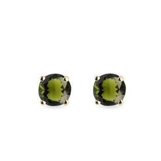 Round moldavite stud earrings in yellow gold
