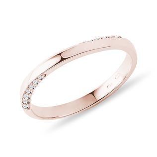 Wave wedding ring with diamonds in rose gold