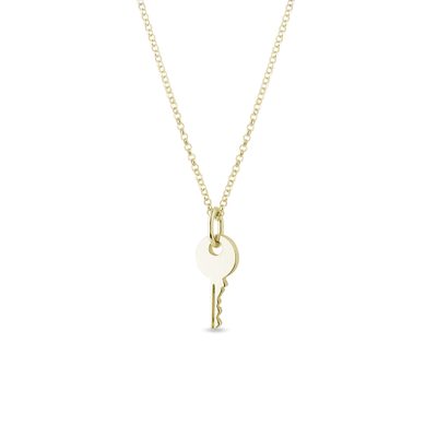 Gold key pendant