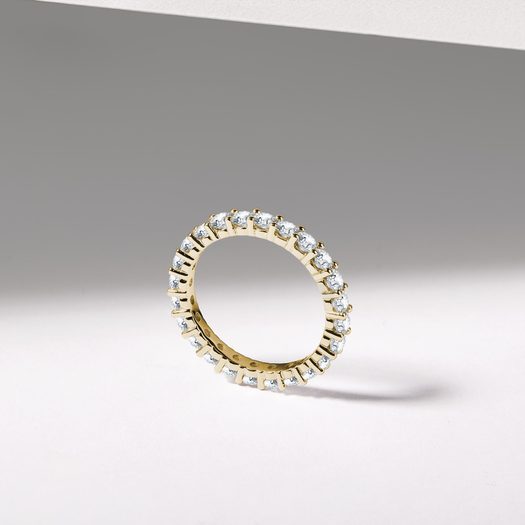 BRILIANTOVÝ ETERNITY PRSTEN VE ŽLUTÉM ZLATĚ - DÁMSKÉ SNUBNÍ PRSTENY{% if kategorie.adresa_nazvy[0] != zbozi.kategorie.nazev %} - SNUBNÍ PRSTENY{% endif %}