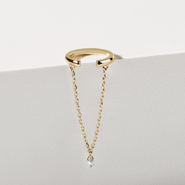 YELLOW GOLD SINGLE EAR CUFF WITH A DIAMOND AND CHAIN - EAR CUFFS - 