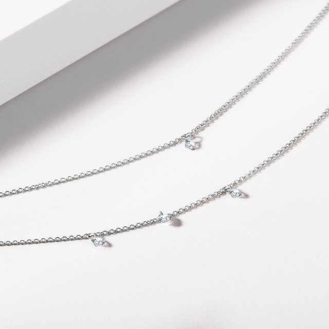 ŘETÍZKOVÝ NÁRAMEK S PROVRTANÝM DIAMANTEM V BÍLÉM ZLATĚ - NÁRAMKY S DIAMANTY - 