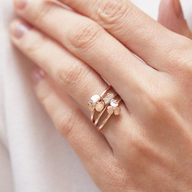 RING AUS ROTGOLD MIT KLEEBLATT - RINGE DIAMANT - 