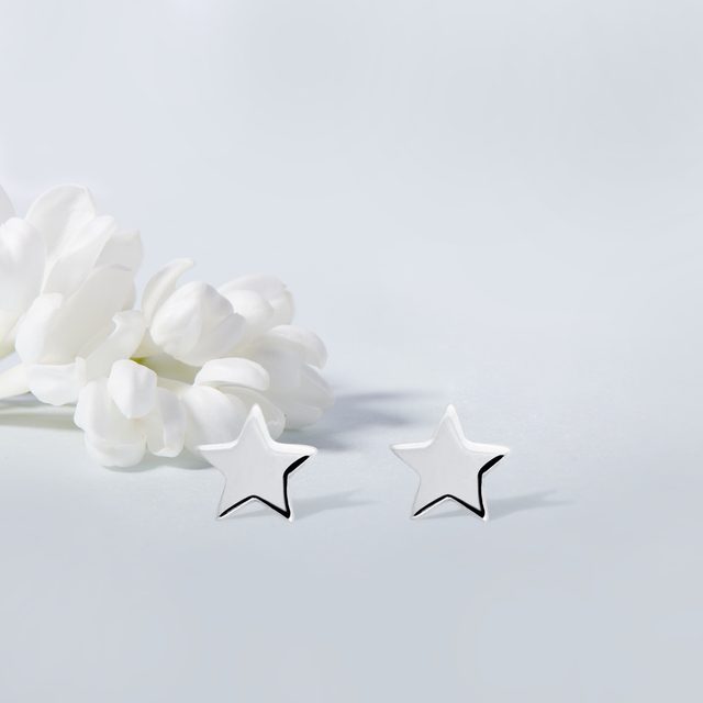 STAR-SHAPED EARRINGS IN WHITE GOLD - WHITE GOLD EARRINGS - 