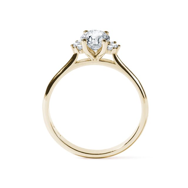 OVAL DIAMOND RING WITH SIDE DIAMONDS IN YELLOW GOLD - DIAMOND ENGAGEMENT RINGS - 