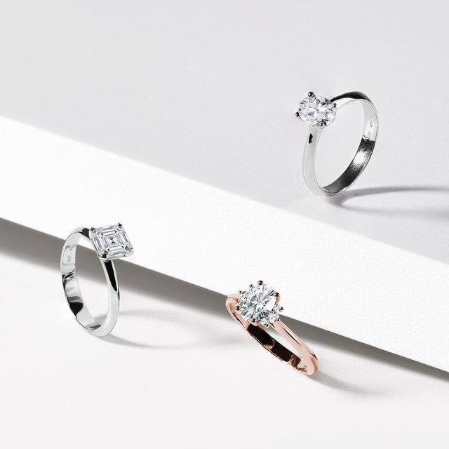 ROSE GOLD OVAL DIAMOND RING WITH SIDE DIAMONDS - DIAMOND ENGAGEMENT RINGS - 