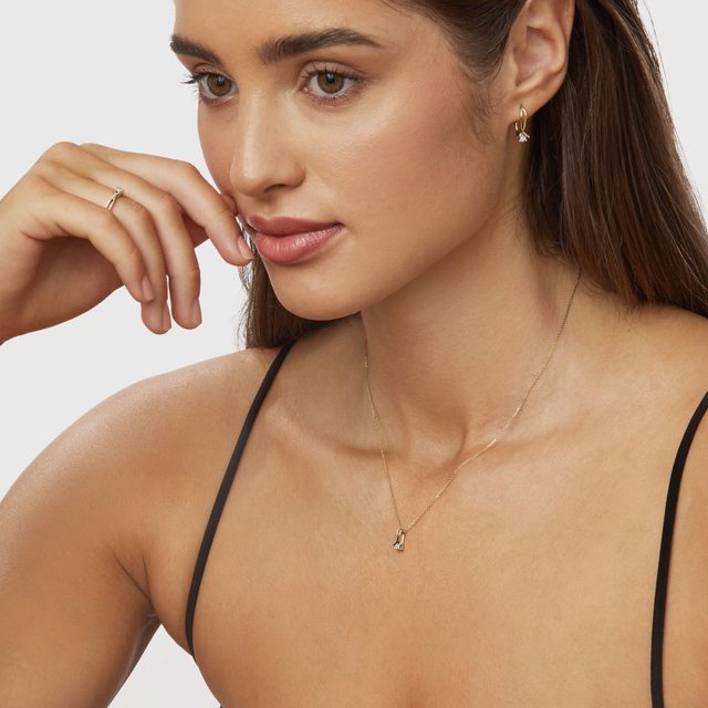 BOUCLES D'OREILLES DOUBLE RUBAN EN OR ET DIAMANT - BOUCLES D'OREILLES EN DIAMANT - 