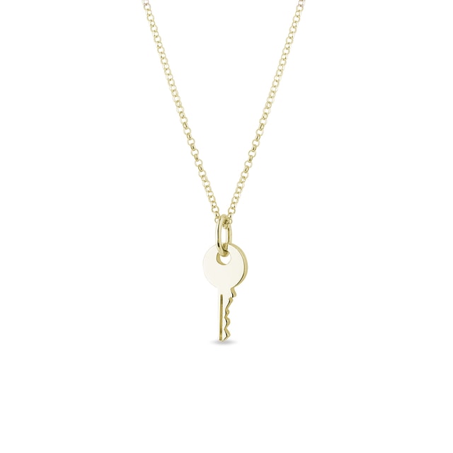 Gold key pendant