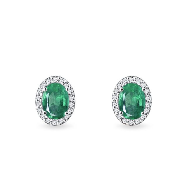 Ovale Ohrringe mit Smaragden und Diamanten in Weißgold