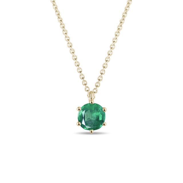 Round emerald pendant in gold