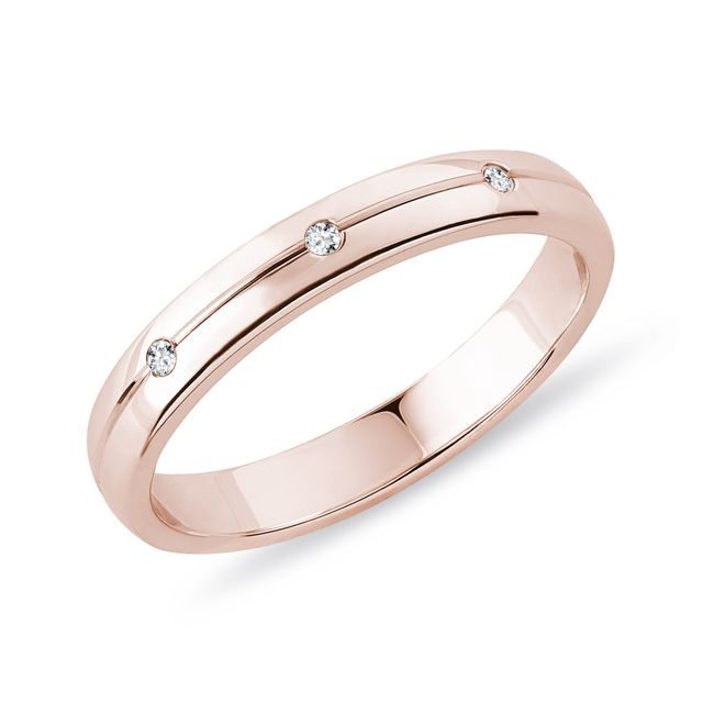 Dámský snubní prsten z růžového zlata s diamanty