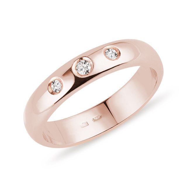 Masivní snubní prsten z růžového zlata s diamanty