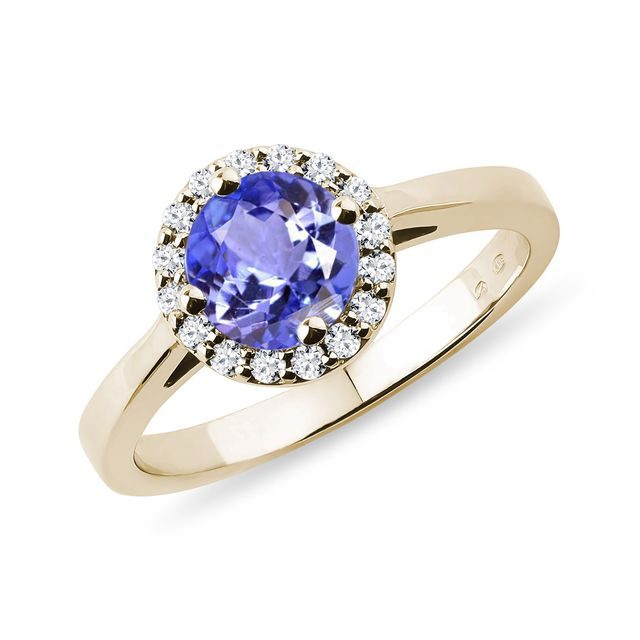 Gold halo ring with tanzanite and diamonds