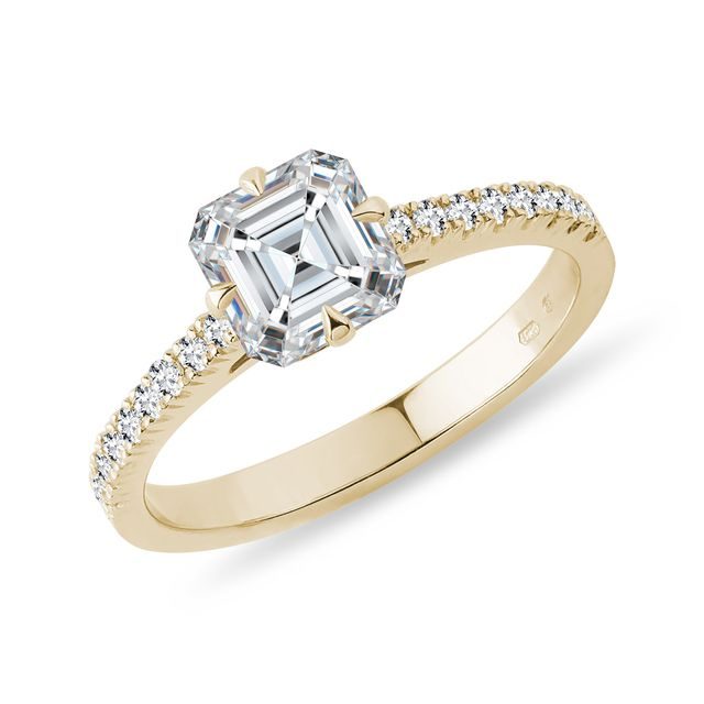 Asscher cut diamond engagement ring in yellow gold